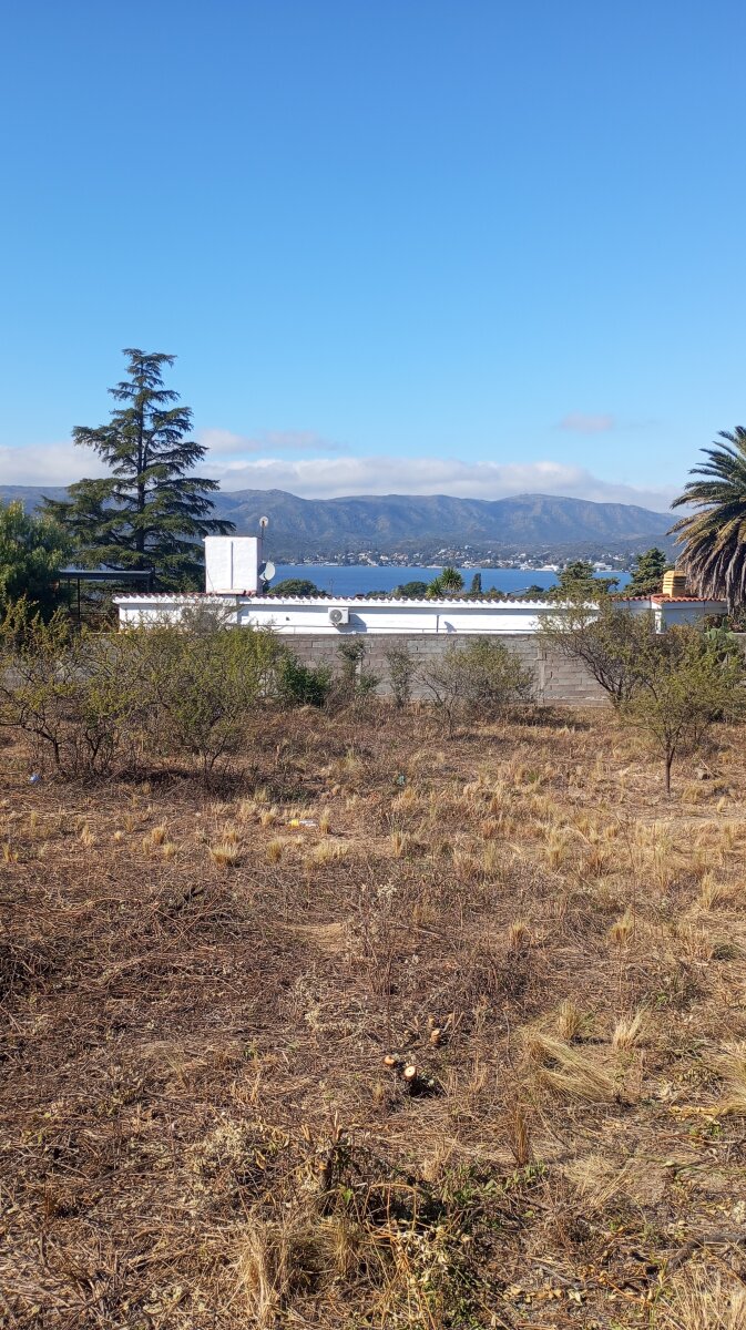 VENDO LOTE , A 10 MINUTOS DE CARLOS PAZ, BARRIO CERRADO " VILLA LAGO AZUL"