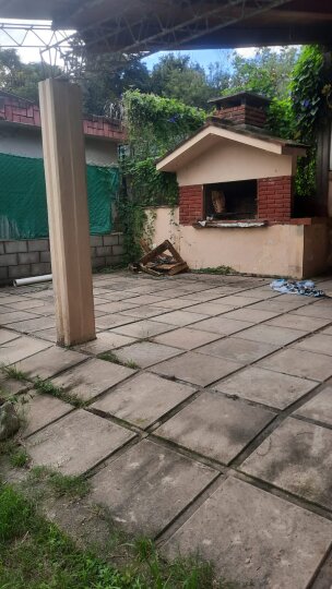 vendo lote en Unquillo con pequeña construccion