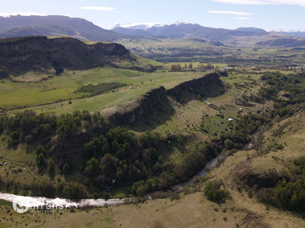 A dirt road leading to the ranch property