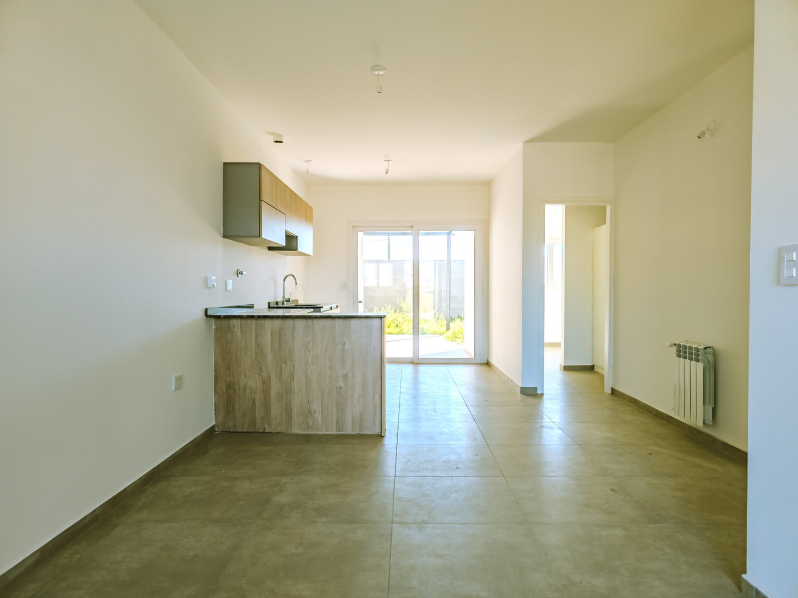 Duplex A Estrenar de 2 dormitorios con calefaccion central, cochera y asador. Docta Avenida