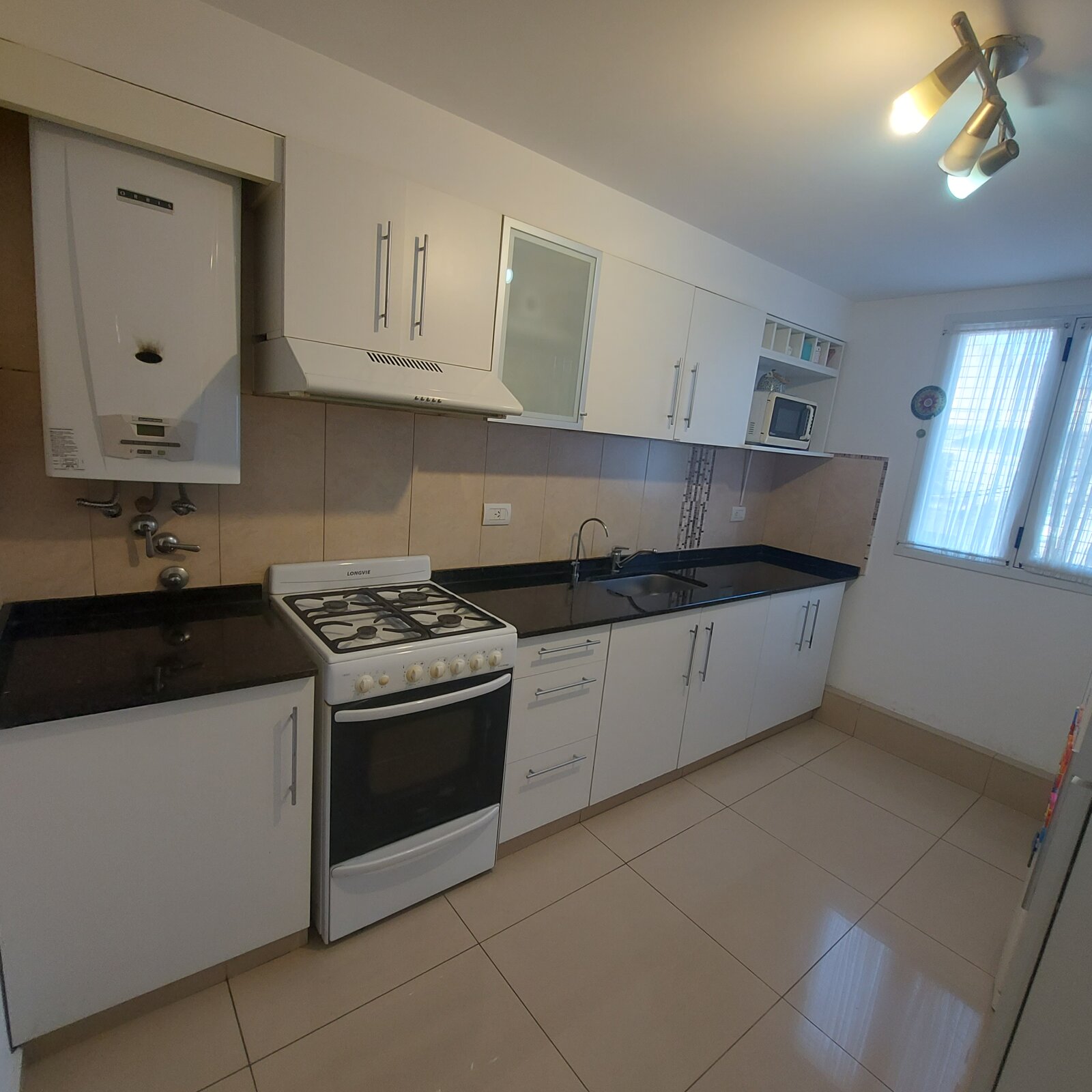 Venta departamento 2 dormitorio con patio barrio Lourdes - 10