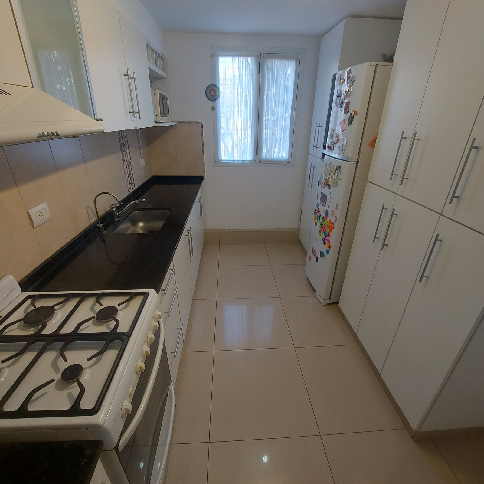 Venta departamento 2 dormitorio con patio barrio Lourdes - 13