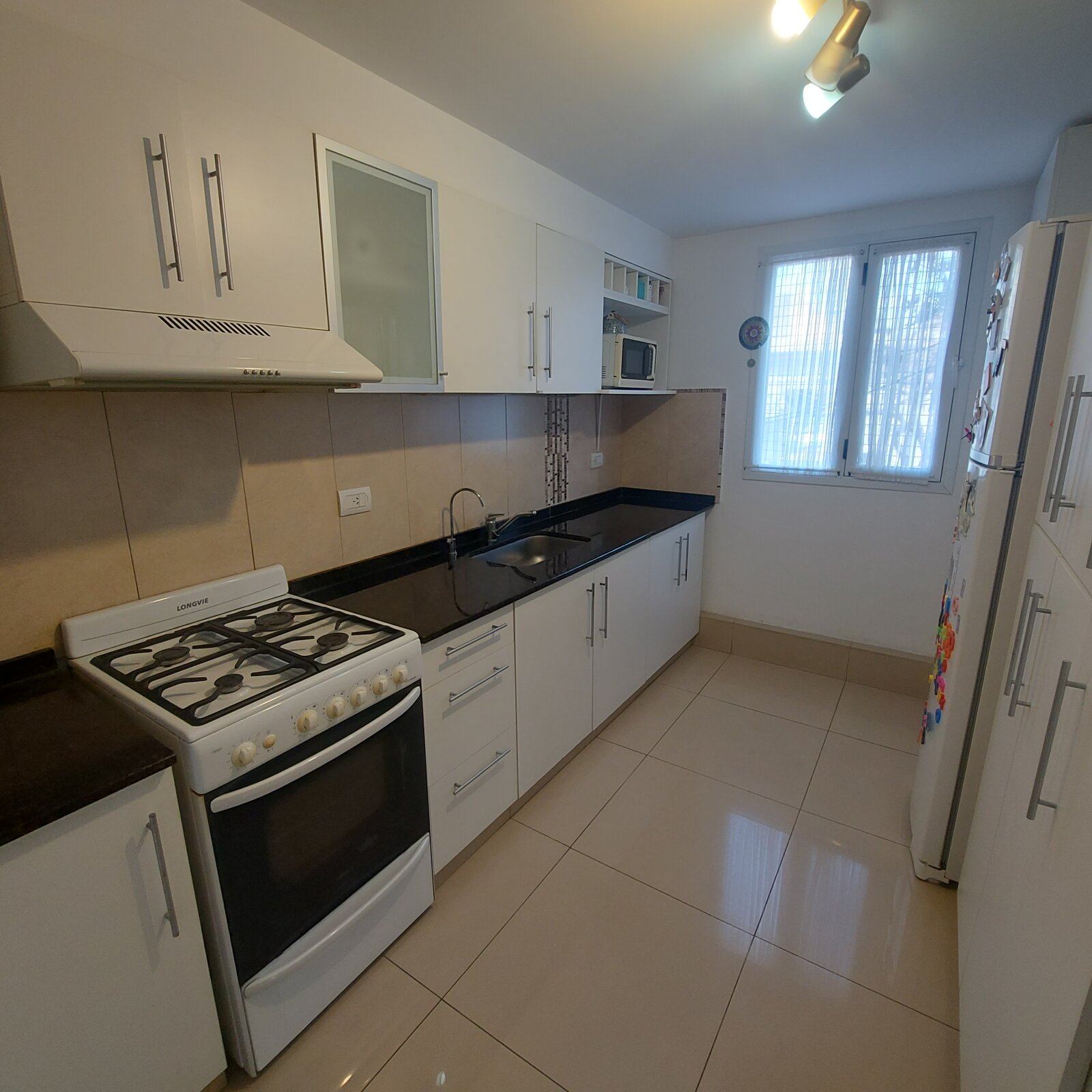 Venta departamento 2 dormitorio con patio barrio Lourdes - 9