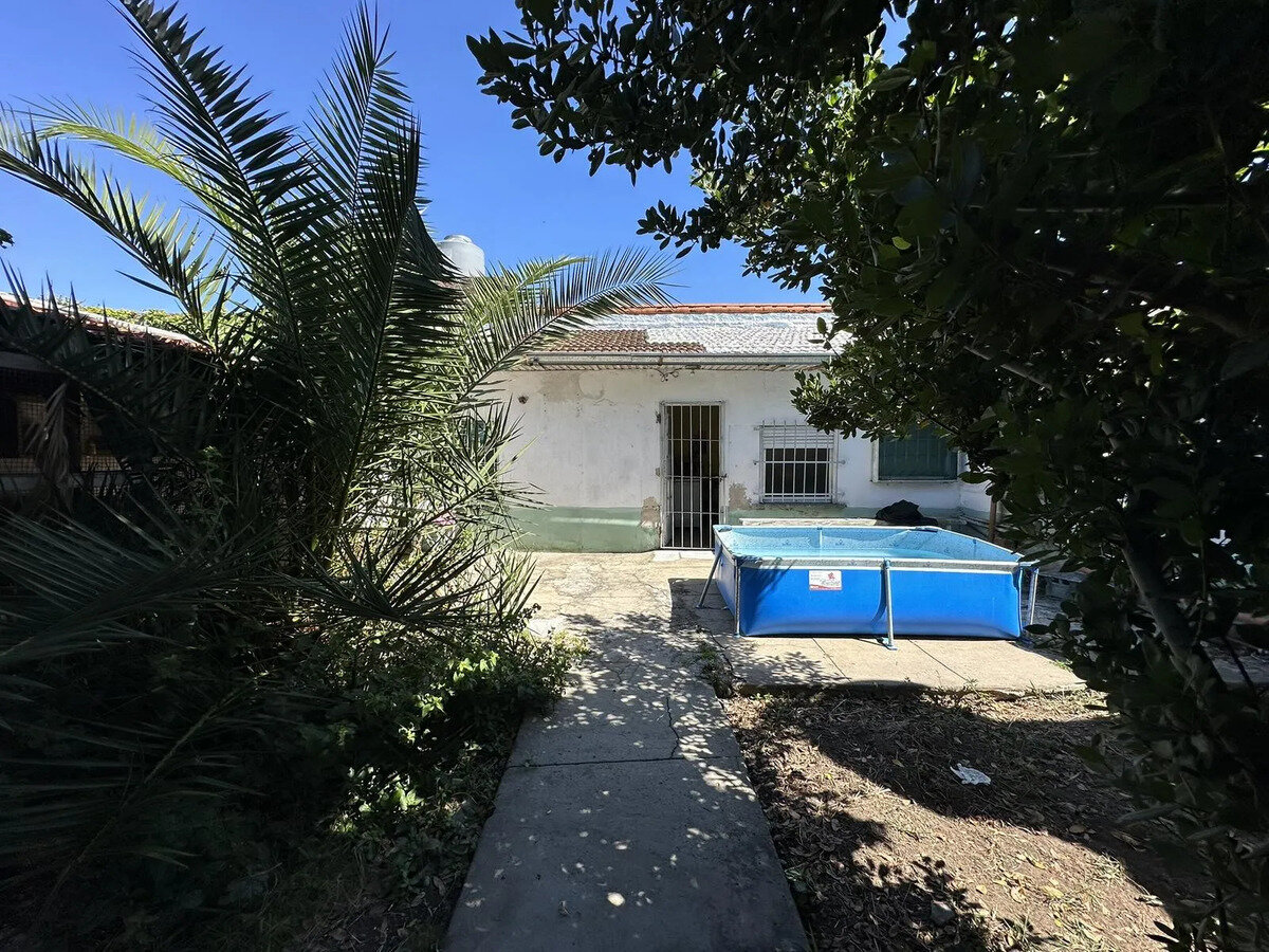 CASA CON DEPARTAMENTO - 16