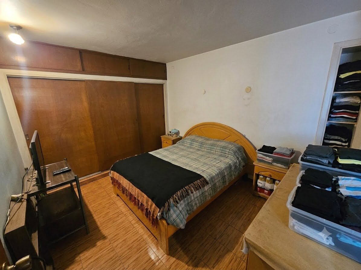 Dormitorio principal con baño en suite