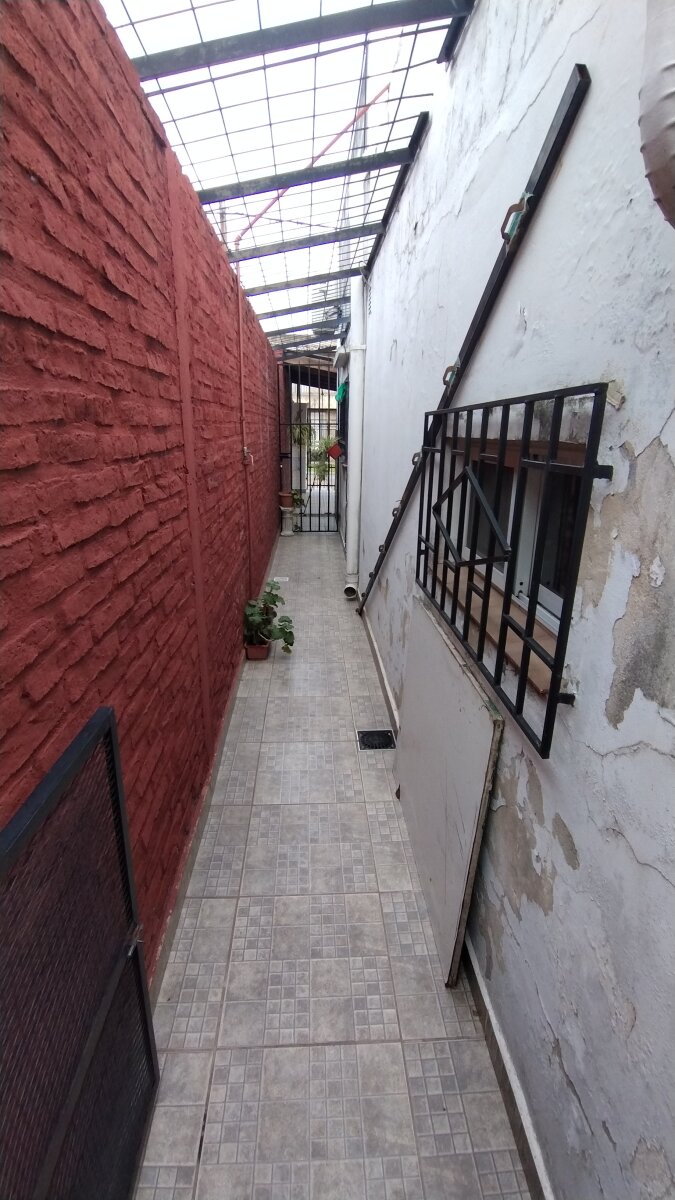 Tu casa en La Florida: 2 dormitorios, patio y cochera doble - 11