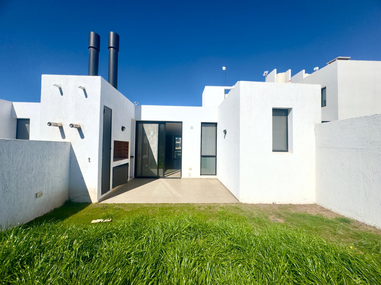Dúplex a estrenar 2 dorm planta baja patio cochera Solares de Manantiales - Imagen 8