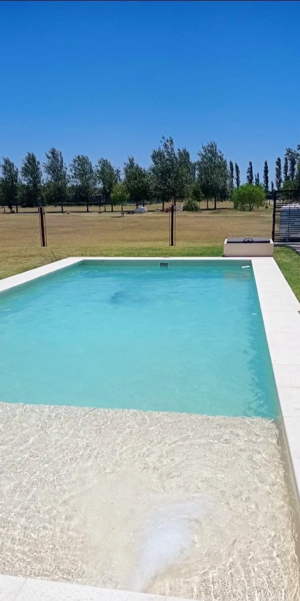 Casa amoblada en alquiler anual, Haras de Funes (barrio cerrado) 3 dorm, pileta, 3 cocheras - 13