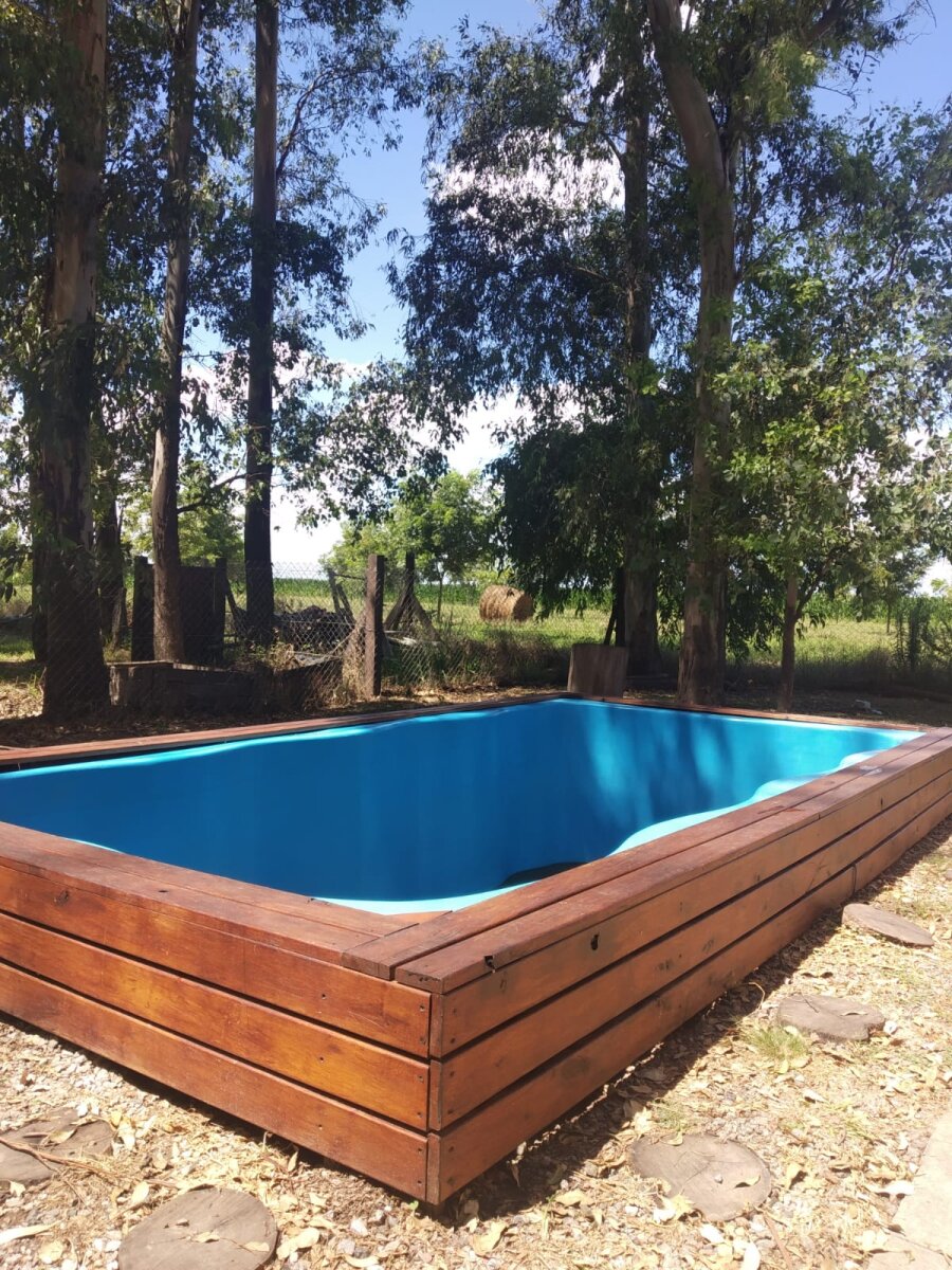 VENTA CASA UN DORMITORIO Y COMODÍN PISCINA EN CAMPO TIMBÓ - 2