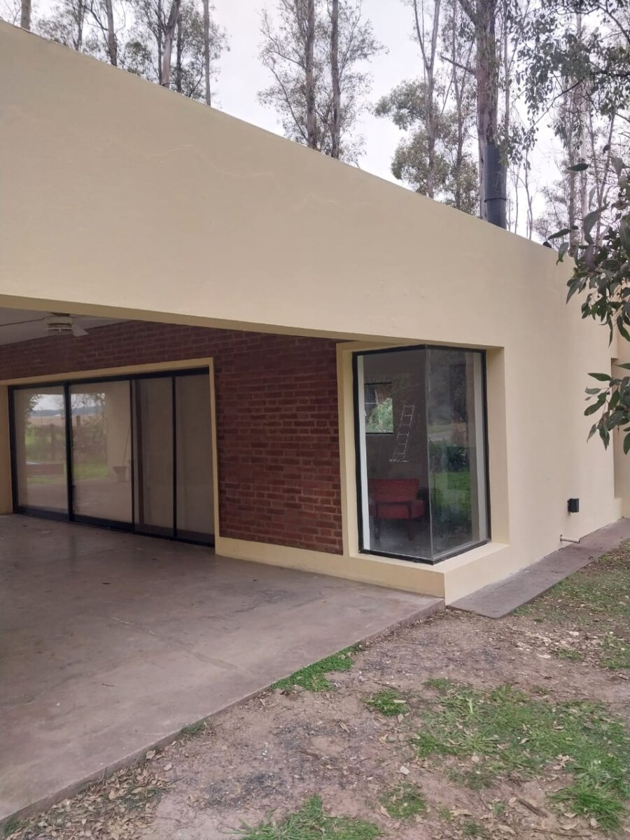 VENTA CASA UN DORMITORIO Y COMODÍN PISCINA EN CAMPO TIMBÓ - 6