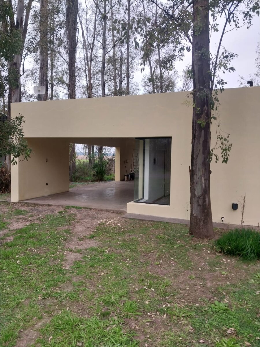 VENTA CASA UN DORMITORIO Y COMODÍN PISCINA EN CAMPO TIMBÓ - 8