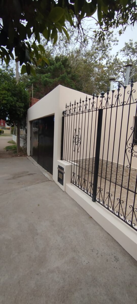 CASA 2 DORMITORIOS AMOBLADA CON JARDÍN Y COCHERA - 23