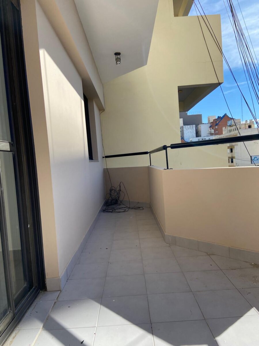EXCLUSIVO DEPARTAMENTO CON COCHERA SOBRE AV. ROCA - PUERTO MADRYN - 14