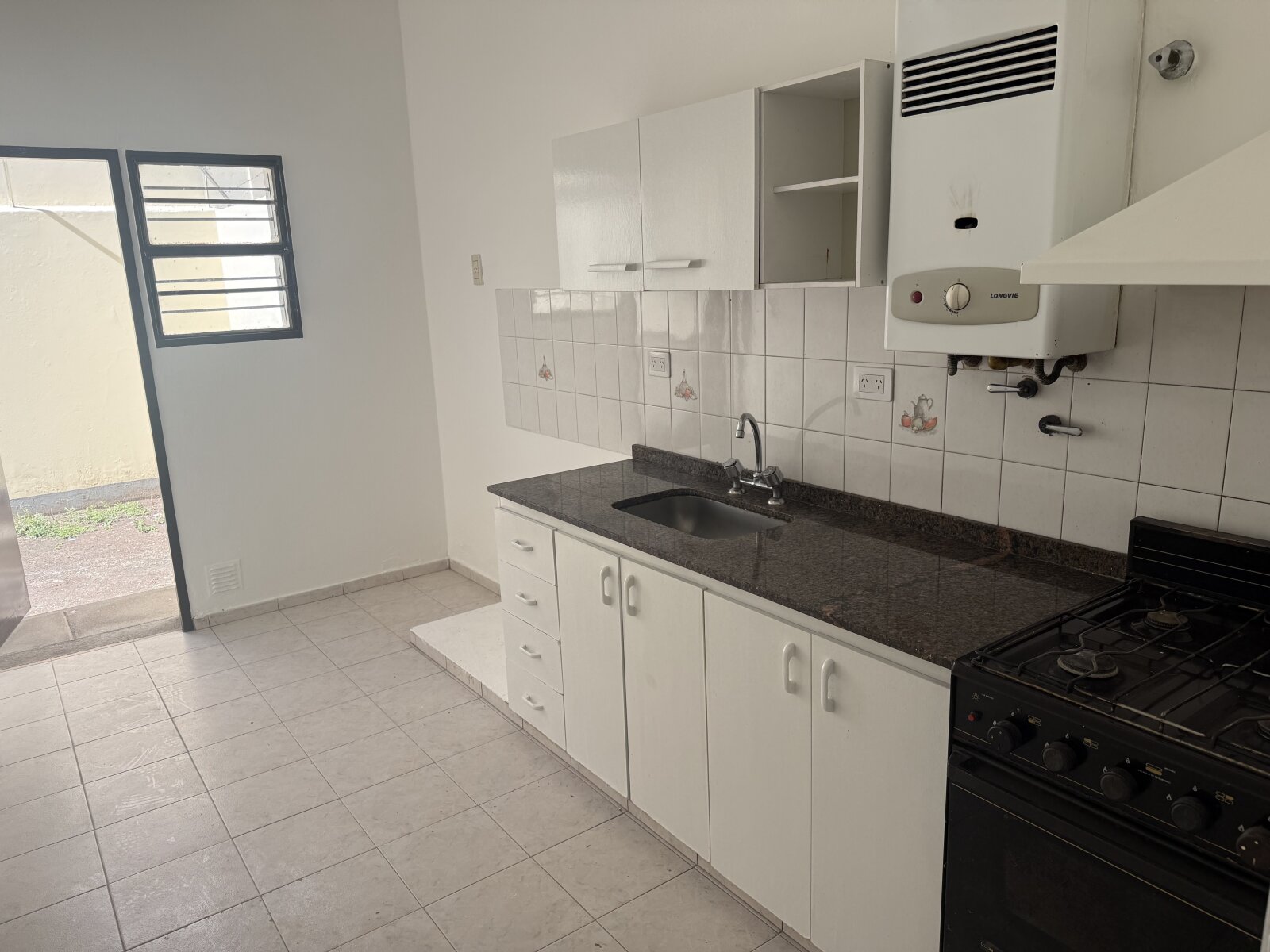 Casa 2 dorm, patio con asador en B° San Martín- escritura apta crédito — foto 8