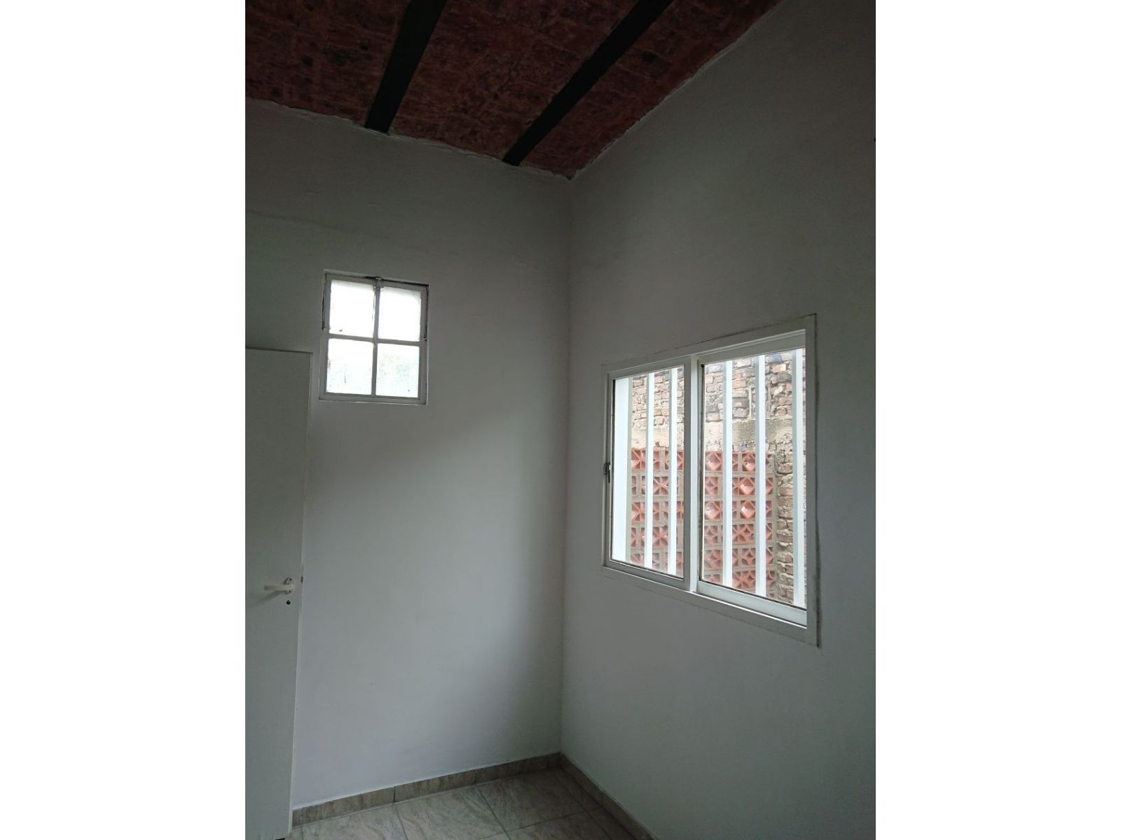 Casa de dos dormitorios y un comodin PLanta Alta - 9
